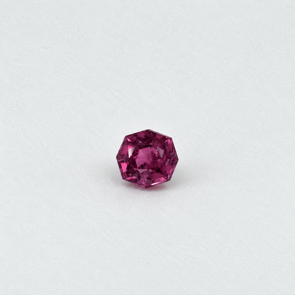 0.20 ct included garnet loose gemstone